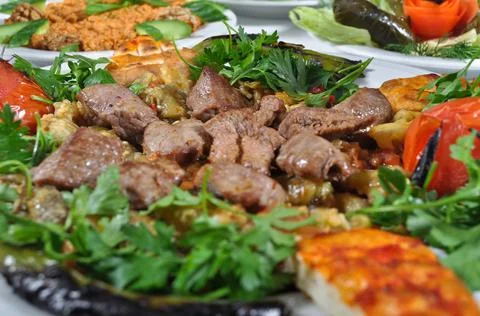 Dining table and lamb shish kebab in a luxury restaurant, Turkish shish kebab Stock Photos