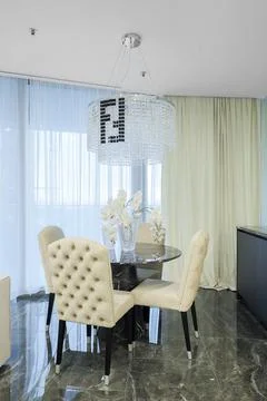 Dining table apartment interior chairs Stock Photos