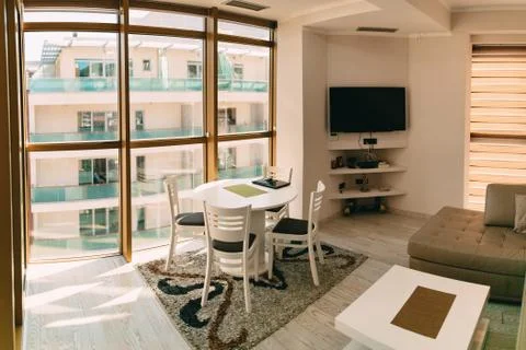 The dining table in the apartment. Table for lunch in the living Stock Photos