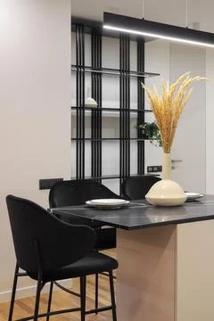 Dining table black marble top Stock Photos