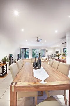 Dining table with chair middle of hall Stock Photos