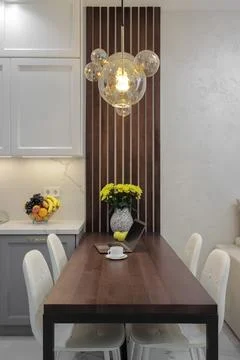 Dining table with chairs in the kitchen interior 库存照片
