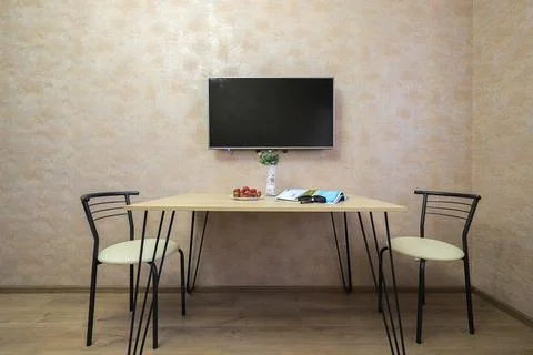 Dining table with chairs in the kitchen interior Foto stock