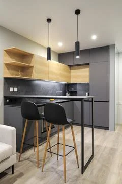 Dining table with chairs in the kitchen interior Foto stock