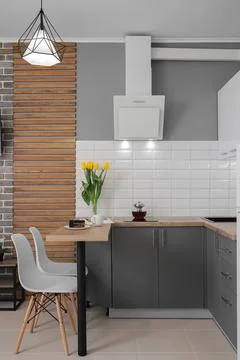 Dining table with chairs in the kitchen interior Stock-Fotos