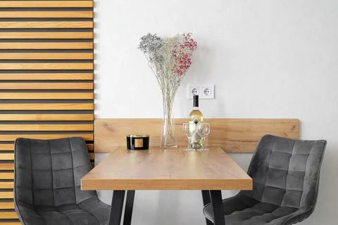 Dining table with chairs in the kitchen Stock Photos