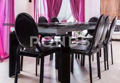Dining table with chairs Stock Photos