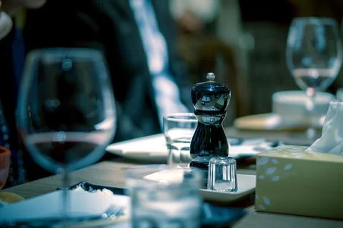 Dining table in a fine dining restaurant with a blue tone atmosphere Stock Photos