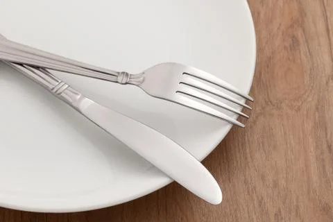 Dining table with fork and knife Stock Photos