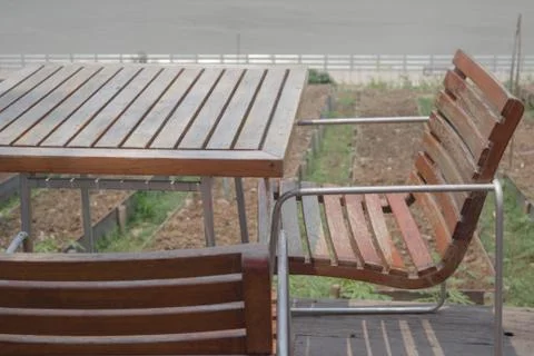 Dining table in garden Stock Photos