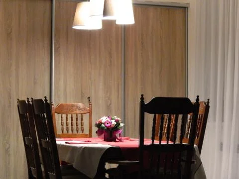 Dining table in the interior of the house Stock Photos