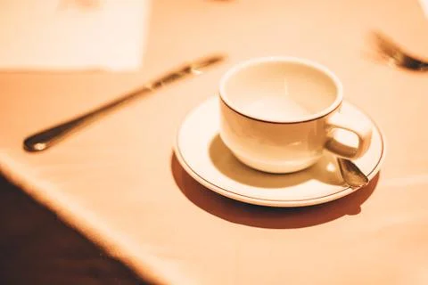 Dining table laid bare in the elegant restaurant. Stock Photos
