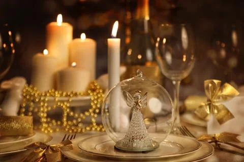 Dining table with lighted candles Stock-Fotos