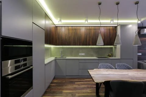 Dining table in a modern kitchen interior Photos