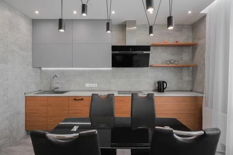 Dining table in a modern kitchen interior Photos