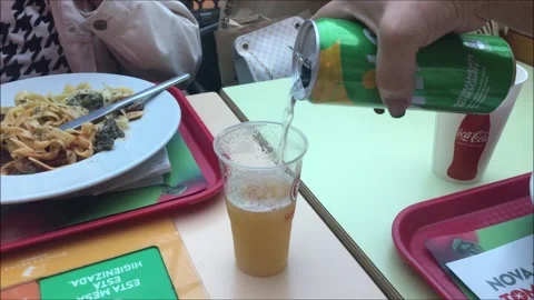 Dining table with a person's hand filling a glass Stock Footage 284567205