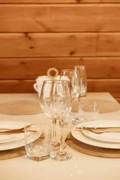 Dining Table Place Setting in Cozy Wooden Cabin Stock Photos