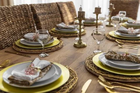 Dining table with plates arrangement Foto stock