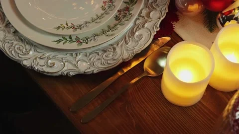 A dining table prepared for Christmas dinner. home decorated for Christmas Stock Footage 165383348
