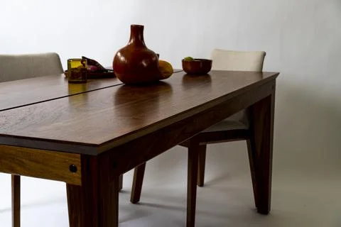 Dining table ready for dinner, on white background design furniture, mexico Stock Photos