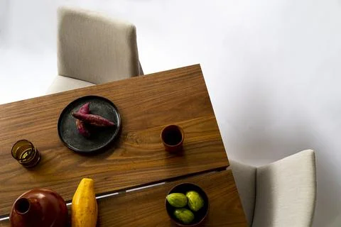 Dining table ready for dinner, on white background design furniture, mexico Foto stock