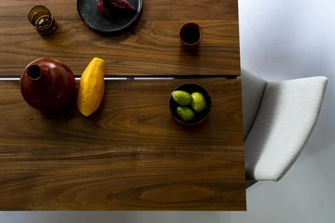 Dining table ready for dinner, on white background design furniture, mexico 스톡 사진