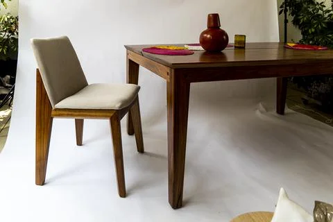Dining table ready for dinner, on white background design furniture, mexico Foto stock