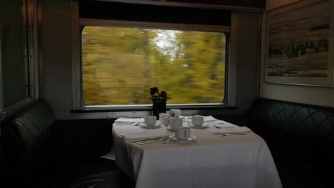 A Dining Table ready for Guests on the Canadian Passenger Train Stock Footage 92648482