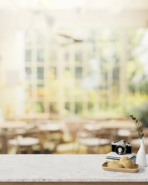 A dining table in a restaurant or coffee shop with a view from a garden on .. Stock Photos