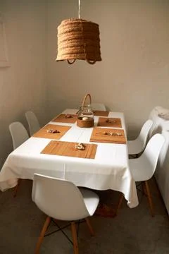 Dining table with set of chairs. Stock Photos