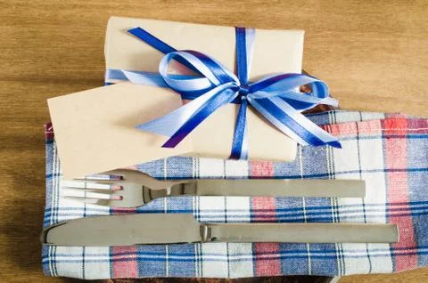 Dining Table Setting with Empty Tag and Present. Stock Photos