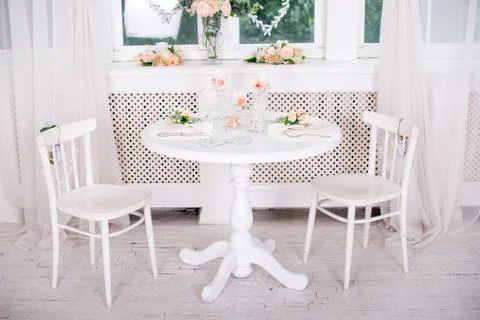 Dining table setting at Provence style, with candles, lavender, vintage crockery Stock Photos