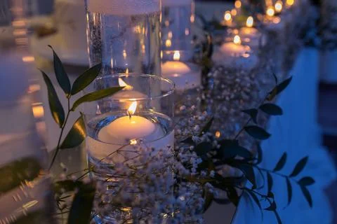 Dining table setting at provence style, with candles and lavender. Stock Photos