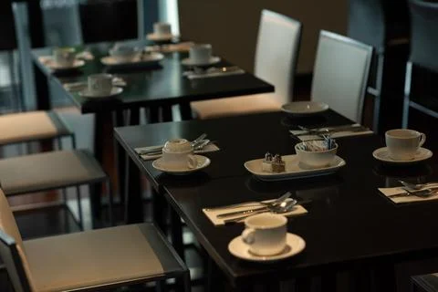 Dining table setting in restaurant Stock Photos