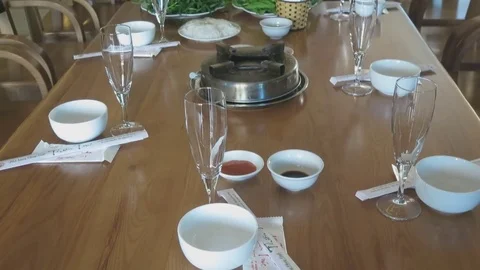 Dining table in the store Stock Footage 70303894