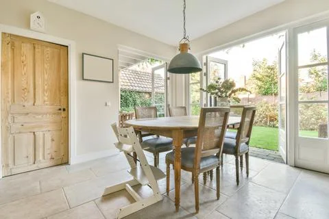 Dining table in stylish apartment Stock Photos