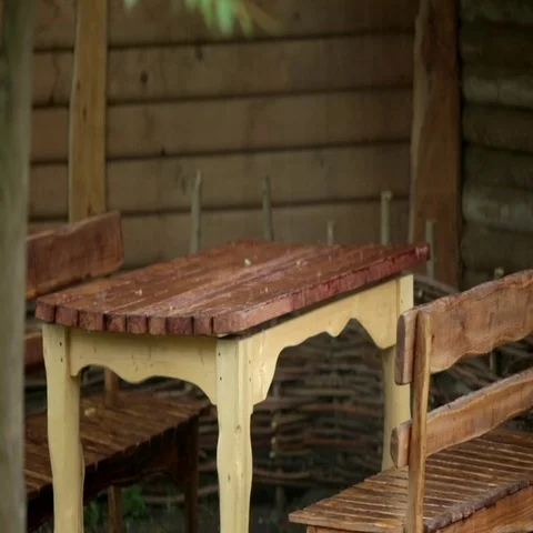 Dining table in the yard in a rustic style Stock Footage 69535112