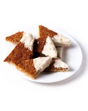 Dining view of triangular-shaped ginger and honey cookies Stock Photos