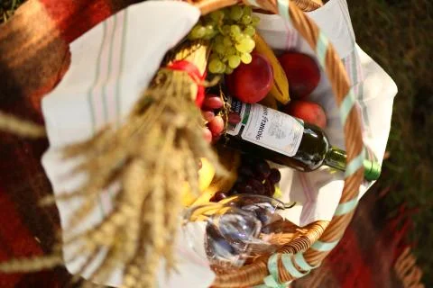 Dinner basket with a bottle Stock Photos