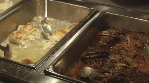 Dinner buffet guests loading plates cu plates 動画素材 35798841