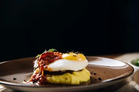 Dinner. Chef's specialty presented in restaurant on served table. Clouse up.  Stock Photos