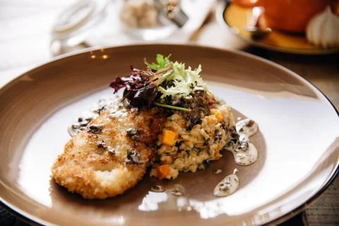 Dinner. Chef's specialty presented in restaurant on served table. Clouse up. Stock Photos