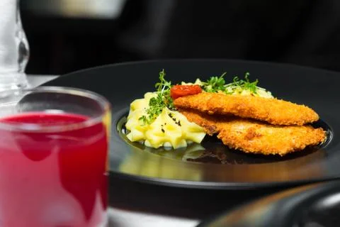 Dinner. Chef's specialty presented in restaurant on served table. Clouse up. Stock Photos