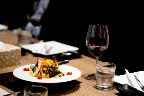 Dinner on a dining table in a restaurant Stock Photos