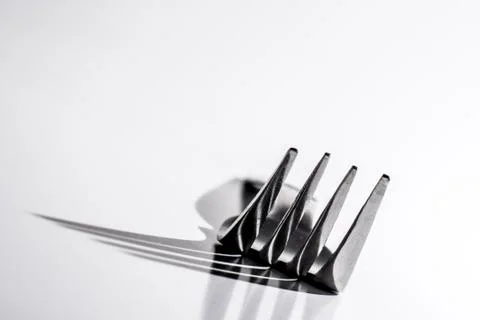 Dinner Fork throws large Shadow Stock Photos