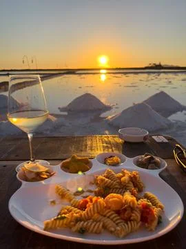 Dinner in front of a sea salt field Stock Photos