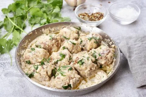 Dinner with meatballs in white sauce 스톡 사진