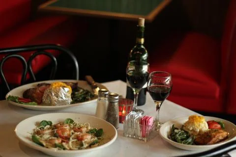 Dinner at a Restaurant Stock Photos