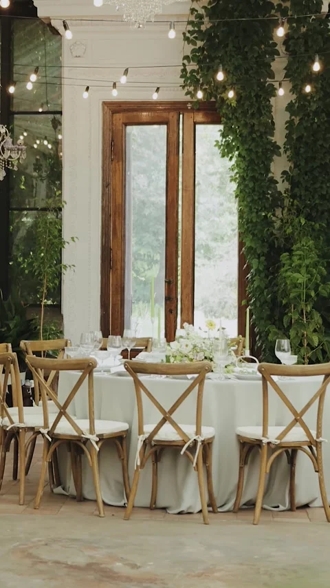 Dinner set up for wedding celebration. Natural Decor and Ambient Lighting to Stock-Footage 306156489