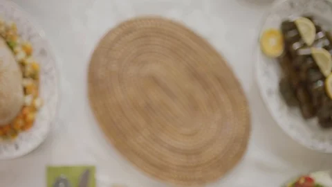 Dinner Table and Presenting Baked Chicken Stock Footage 123089572